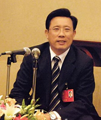 梁稳根图片